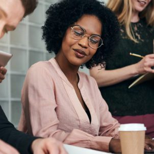 Diverse group of colleagues working together in an office